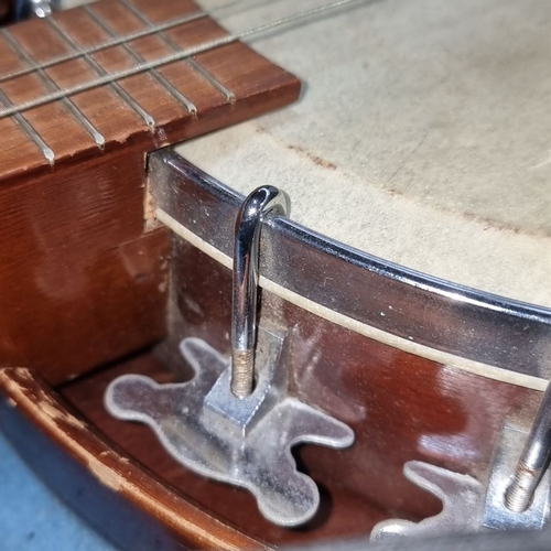 497 - Banjo with resonator, six-string, in hard case with blue interior lining from the mid-20th century. ... 