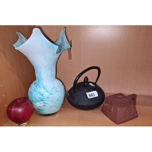 603 - Multicolored art glass vase, cast iron teapot, and a Yixing clay teapot with Chinese seal mark.