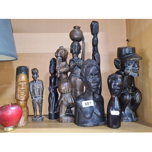 607 - Collection of African tribal wooden sculptures, various sizes and styles, depicting human figures an... 