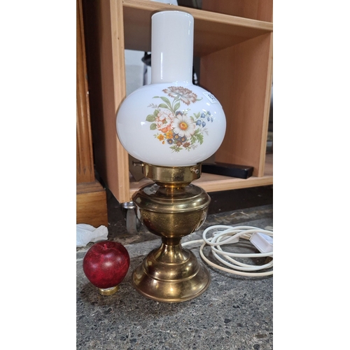 630 - Brass oil lamp with milk glass  floral patterned glass shade, electric conversion. In good order.