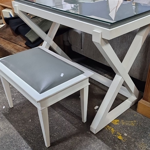 636 - White wooden desk and matching cushioned stool with a glass top and X-frame design. From the lovely ... 