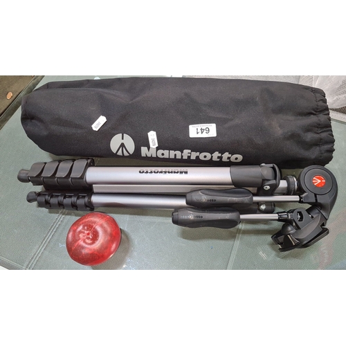 641 - Star Lot : Manfrotto tripod with carry bag. Features durable design, adjustable legs, and quick-rele... 