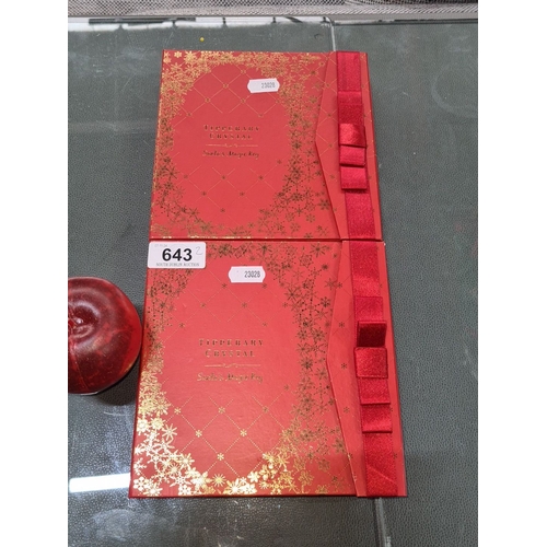 643 - Set includes two keys with Santa motif and red tassels, presented in decorative red boxes with gold ... 