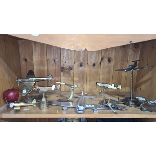 649 - Collection of nine metal model airplanes in various styles, featuring brass and silver-tone finishes... 