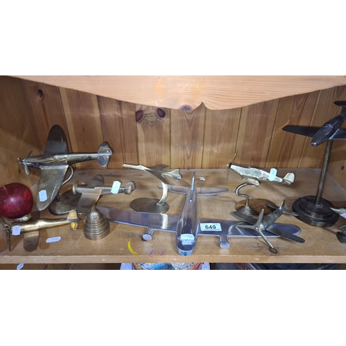 649 - Collection of nine metal model airplanes in various styles, featuring brass and silver-tone finishes... 