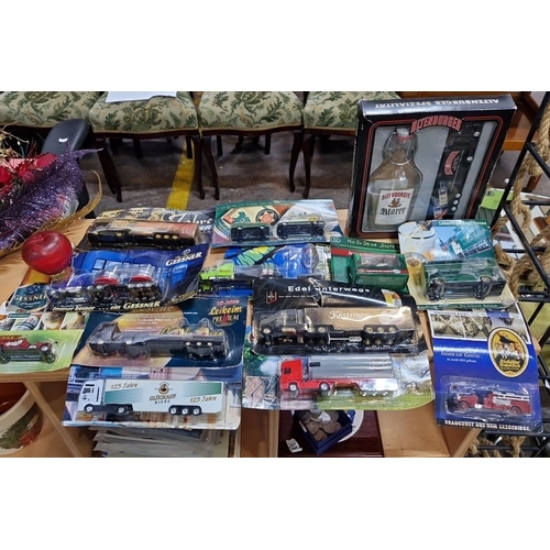 656 - Collection of scale model trucks, including an Altenburger gift set with a miniature truck and liquo... 