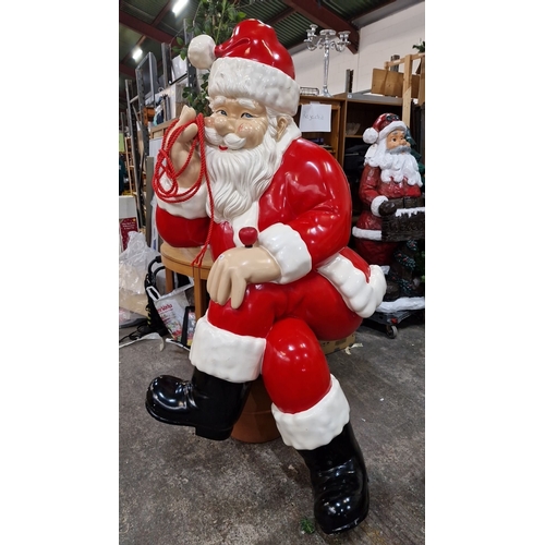 667 - Star lot : A huge 7 feet tall (sitting down ) Large painted Santa Claus figurine, red and white suit... 