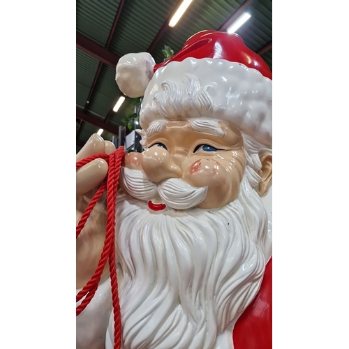 667 - Star lot : A huge 7 feet tall (sitting down ) Large painted Santa Claus figurine, red and white suit... 