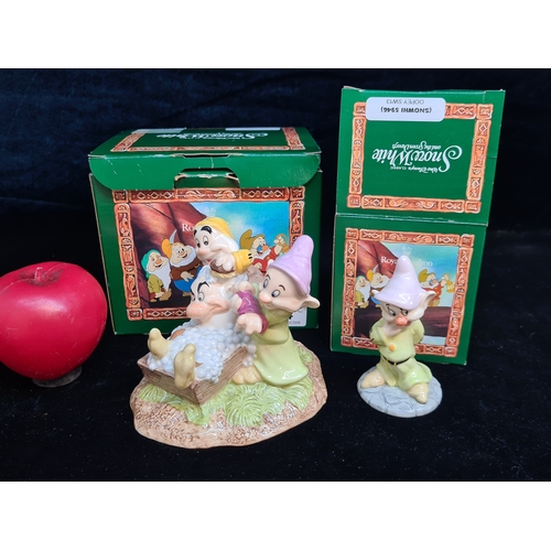 134 - Two Royal Doulton figures from the Snow White Collection including 