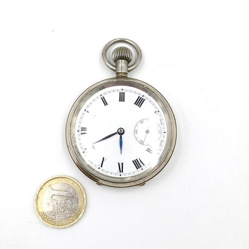 580 - A usual Sterling Silver side wind  Swiss made pocket watch with subsidiary second hand and roman num... 