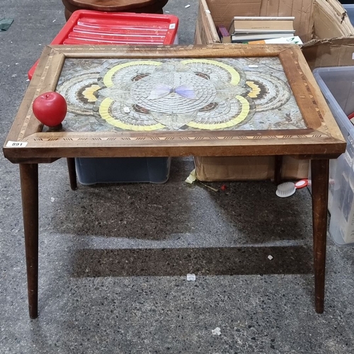 891 - Star lot :A Wooden inlaid table with intricate butterfly marquetry design, featuring a butterfly mot... 