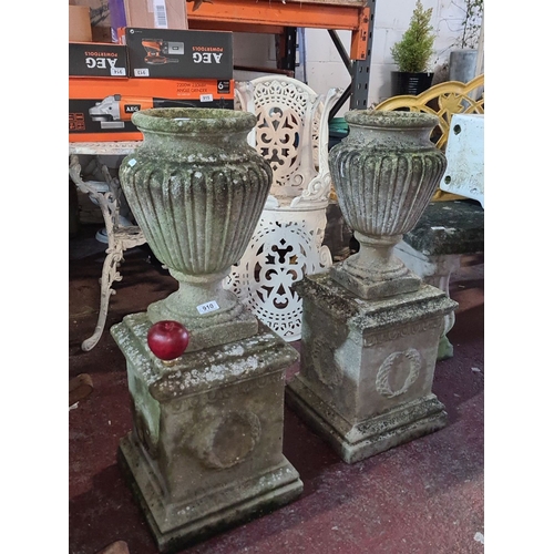 910 - Star lot : A  fabulous Pair of large, classical stone garden urns, featuring fluted body design on s... 