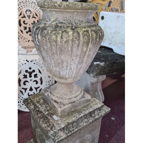 910 - Star lot : A  fabulous Pair of large, classical stone garden urns, featuring fluted body design on s... 