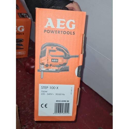 914 - A new in box AEG Powertools 700W Jig Saw, Model STEP 100X, has speeds of 3200/min and comes with a 6... 