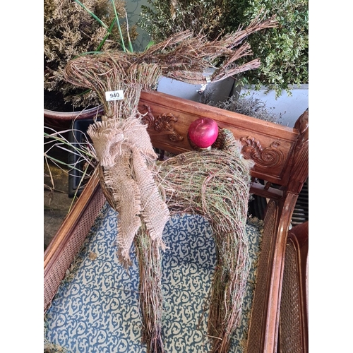 940 - Rustic twig and burlap reindeer sculpture showcasing natural materials.