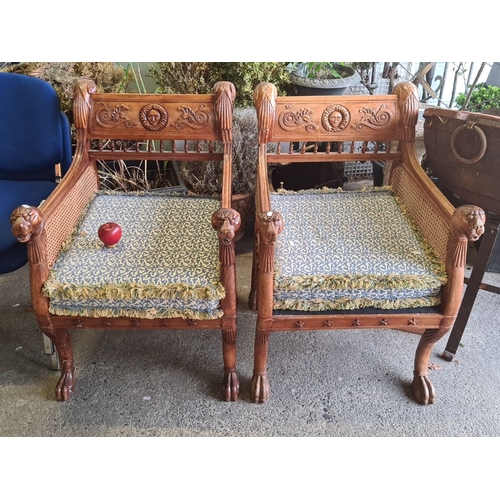 941 - Star lot : A lovely Pair of irish carved wooden armchairs featuring lion motifs,lion paw feet, caned... 