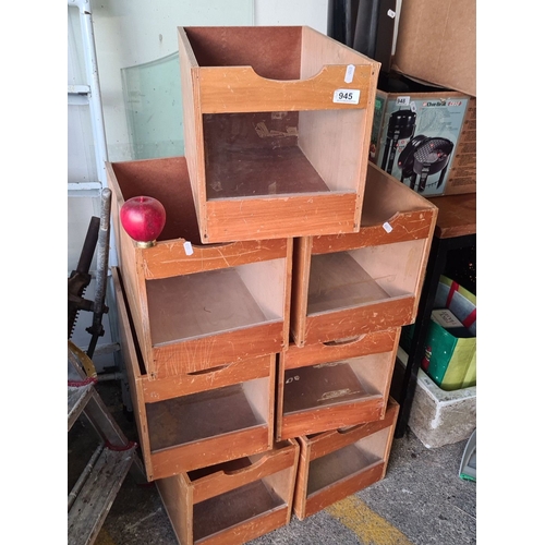 945 - A set of  Vintage wooden habadashery  drawers, mid-century design. It has a natural wood finish and ... 