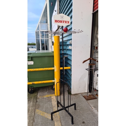 946 - Vintage Hortex store display rack, metal construction with rotating arms, featuring a branded Hortex... 