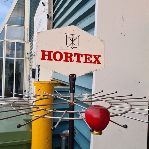 946 - Vintage Hortex store display rack, metal construction with rotating arms, featuring a branded Hortex... 