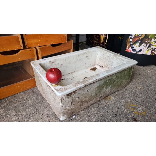 950 - A large belfast sink. Ideal for the garden.