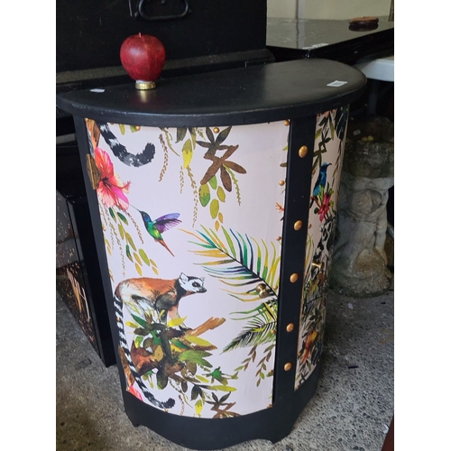 953 - Very Cool Semi-circular cabinet features a tropical wildlife print, with a black top and brass detai... 