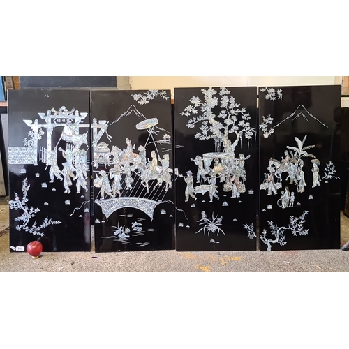 955 - Star lot : A Set of four decorative lacquered panels featuring intricate mother-of-pearl inlays depi... 