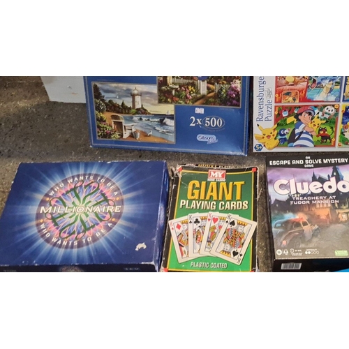 963 - Mixed lot includes jigsaw puzzles, games, and craft items, featuring 