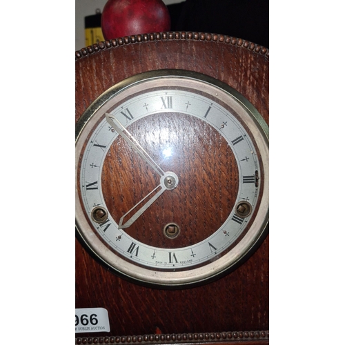 966 - Star lot :A 1940,s longcase grandmother clock in oak with decorative carvings and a domed top has a ... 