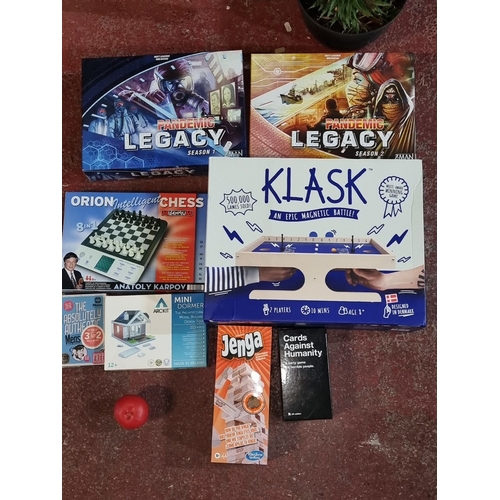 973 - Mixed board game lot featuring Pandemic Legacy (Season 1 & 2), Klask, Orion Intelligent Chess, Arcki... 