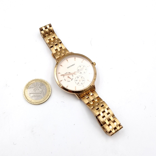 1060 - A large face rose gold coloured 'Sekonda' Ladies Watch. In nice condition.