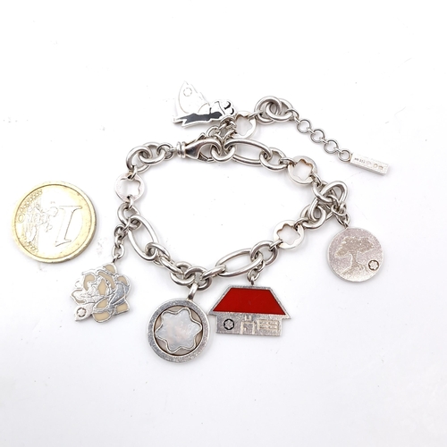 1078 - A sweet Sterling Silver designer 'Mont blanc' charm bracelet. With five charms. Total Weight: 18.7 g