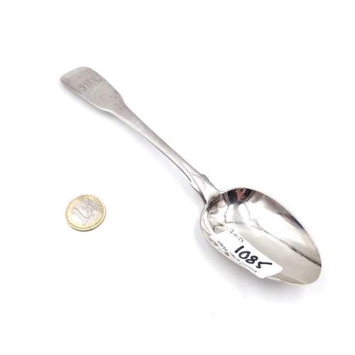 1085 - A very large Irish silver serving spoon. Hallmarked to Dublin and made by Reid & Son silversmiths. W... 