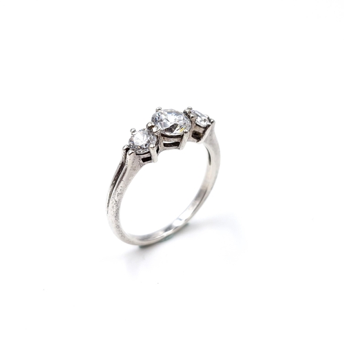 10 - A sterling silver cubic zirconia ring. Size - U. Weight - 3.65 grams. Stones very bright.