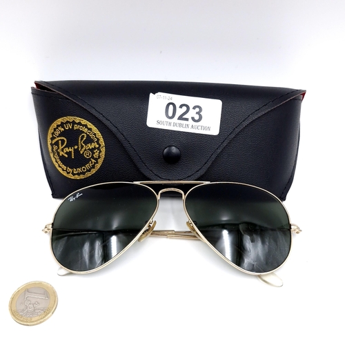 23 - A pair of Ray-Ban aviator style metal framed sunglasses. Lenses clear with no marks or scratches. Co... 