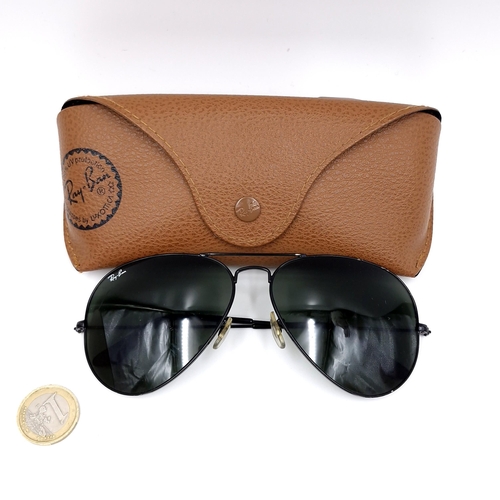 24 - A pair of Ray-Ban black framed aviator style sunglasses. Lenses clear with no marks or scratches. Co... 