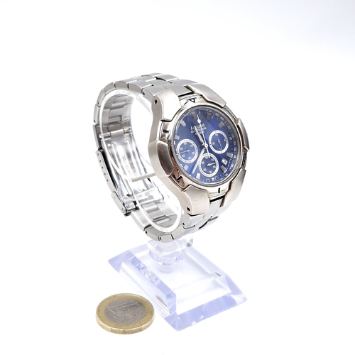 45 - An as new Accurist chronograph wristwatch (WR50M) set with blue enamel dial and luminous hands. Come... 