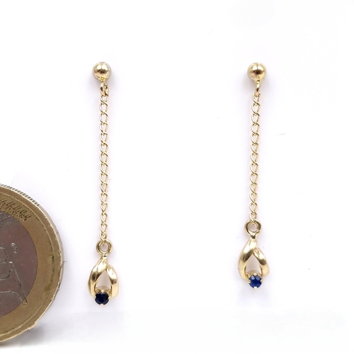 7 - A very elegant pair of nine carat gold sapphire stud earrings. Weight - 0.85 grams.