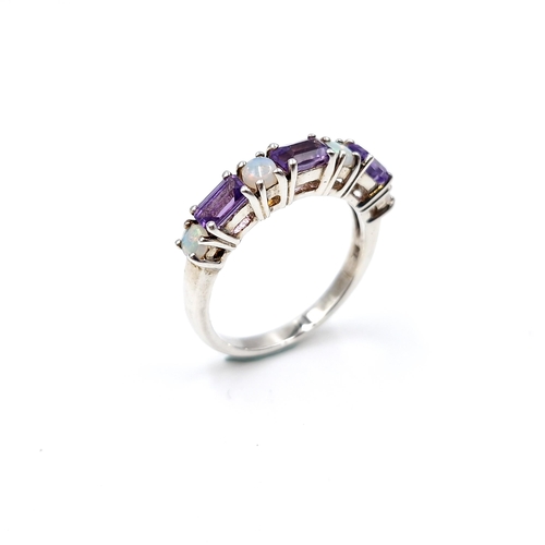 8 - A lovely sterling silver amethyst and opal stone ring. Ring size - N. Weight - 3 grams.