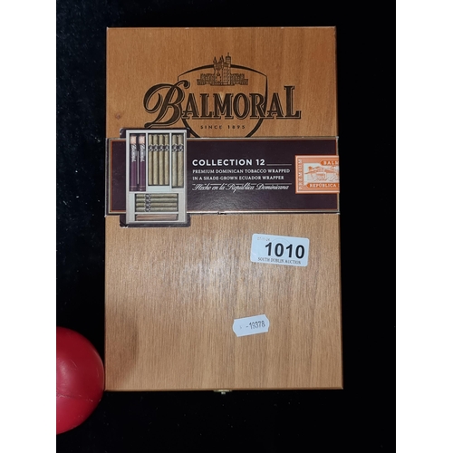 1010 - A fine box of a collection of 12 Balmoral Dominican Cigars. Box includes 4 Panatela, 2 Corona, 2 Cor... 