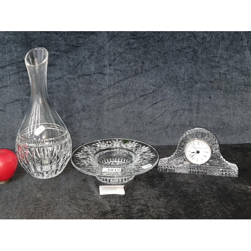 1015 - Three magnificent pieces of crystal including a Tipperary Crystal quartz clock, a Cavan Crystal wine... 