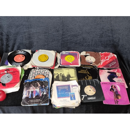 1017 - A box of approxiamtely 87 vinyl inclduing titles such as Donna Summer 'Lucky,' Olivia Newton-John 'F... 