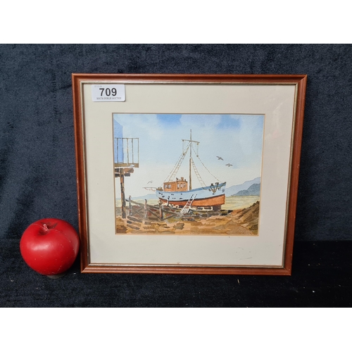 709 - An original 'Brendan Jeffers' watercolour on paper painting titled 'Beached Boat'. Features a nautic... 