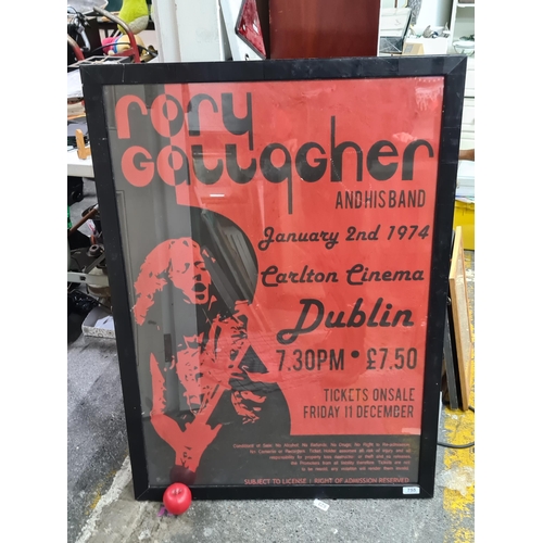 755 - A large vintage print of a 'Rory Gallagher and his band' 1974 Dublin concert poster. Housed in a bla...