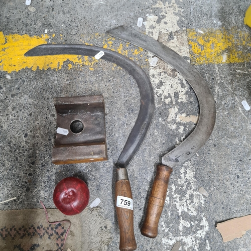 759 - Three antique items comprising of two Sickle and a railway track anvil.