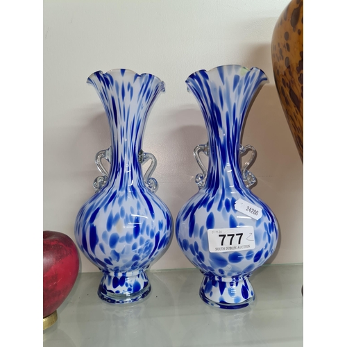 777 - A gorgeous pair of beautifully hand blown vases in tones of cobalt blue and white.