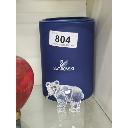 804 - A Swarovski grizzly bear cub with salmon. RRP £90.00 on thecrystallodge.co.uk. Super collectors item... 