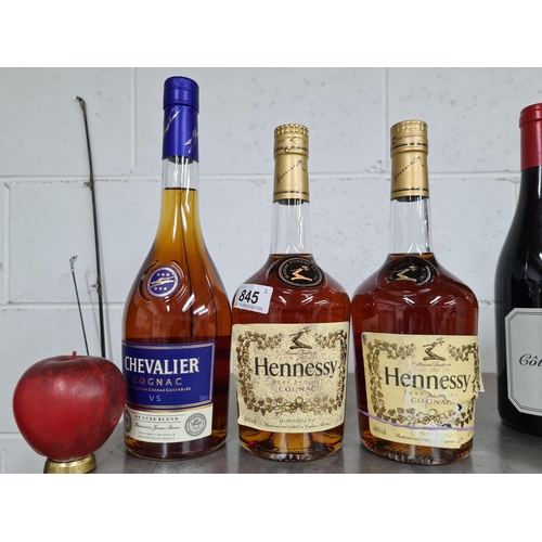 845 - Three bottles of Cognac Brandy including one bottle of Chevalier VS Cognac Deluxe Blend 40%, and two... 