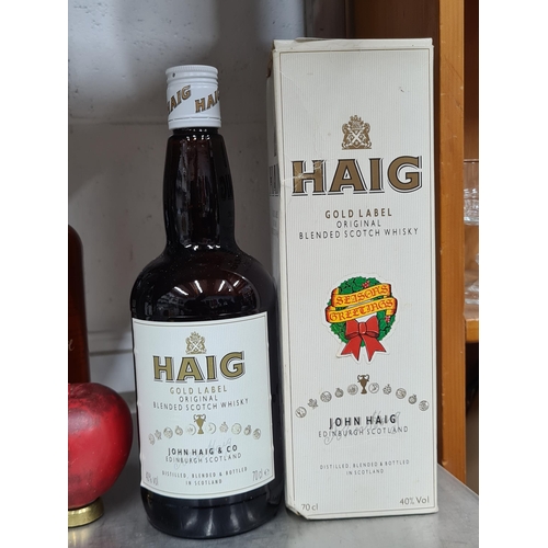 877 - A bottle of Haig Gold Label Original Blended Scotch Whiskey. 70cl 40% in original box.