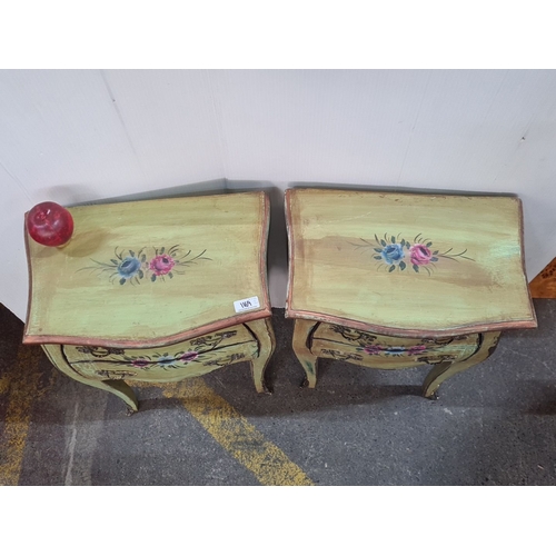 1169 - Star lot : Super pretty Pair of hand-painted wooden nightstands with floral motifs, featuring two dr... 