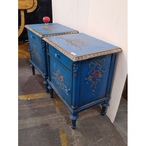 1171 - Star Lot : A lovely Pair of hand-painted blue nightstands with floral motifs and carved detailing. V... 